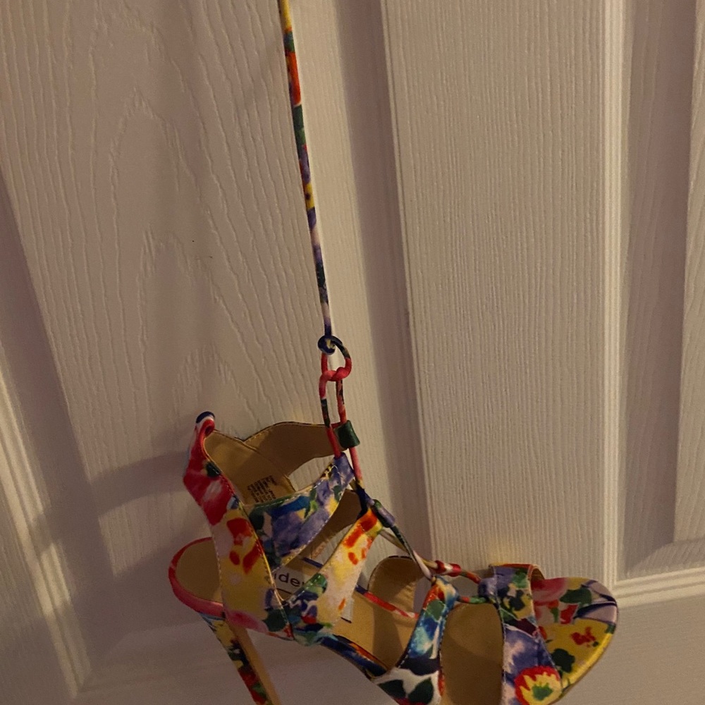 Floral multi colored heels that strap up the ankle